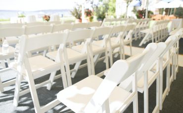 45663,Rows of White Folding Chairs